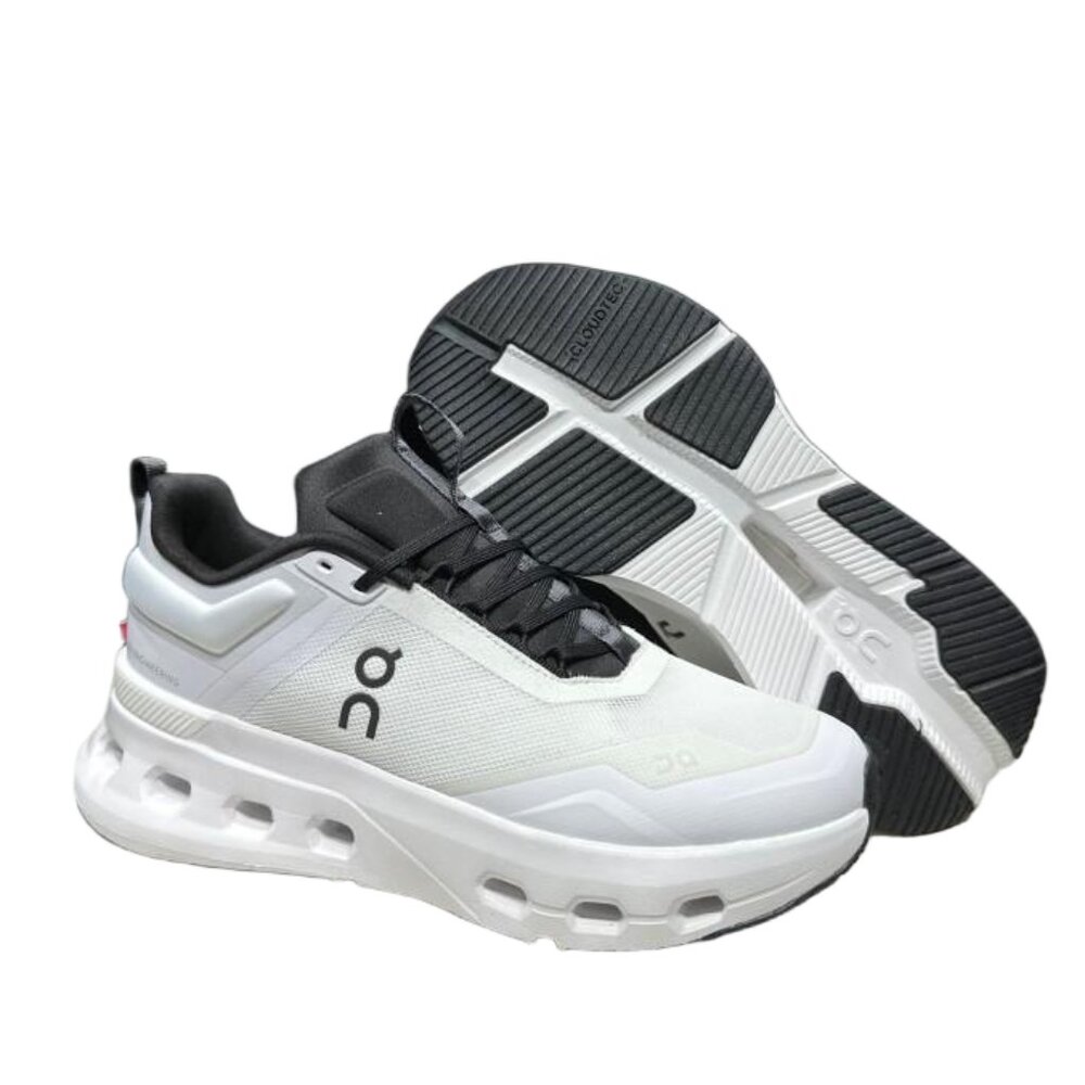 On Running White and Black Athletic Shoes